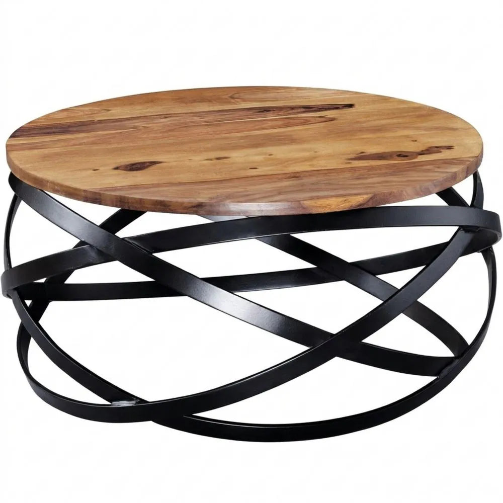 Runder Couchtisch aus Sheeshamholz mit Metallgestell im Industrial Design